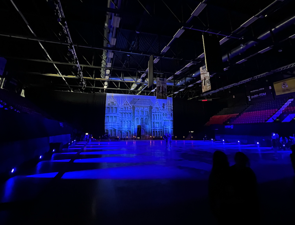 An empty arena with purple lighting