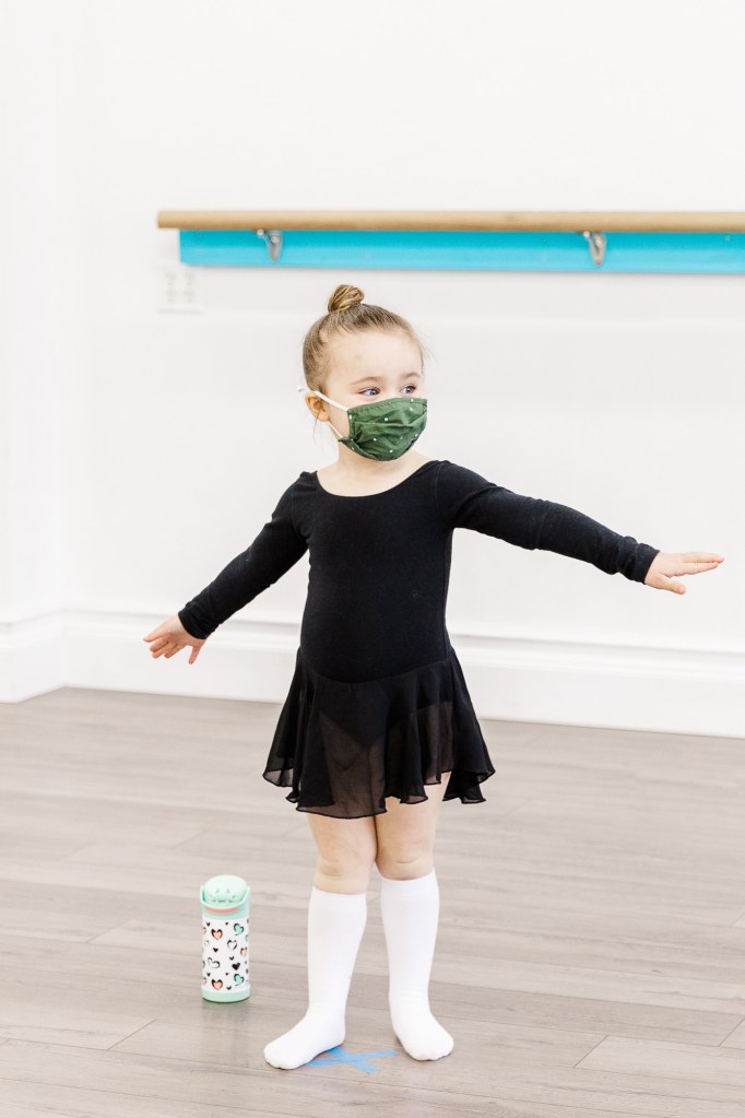 A young dancer wearing black
