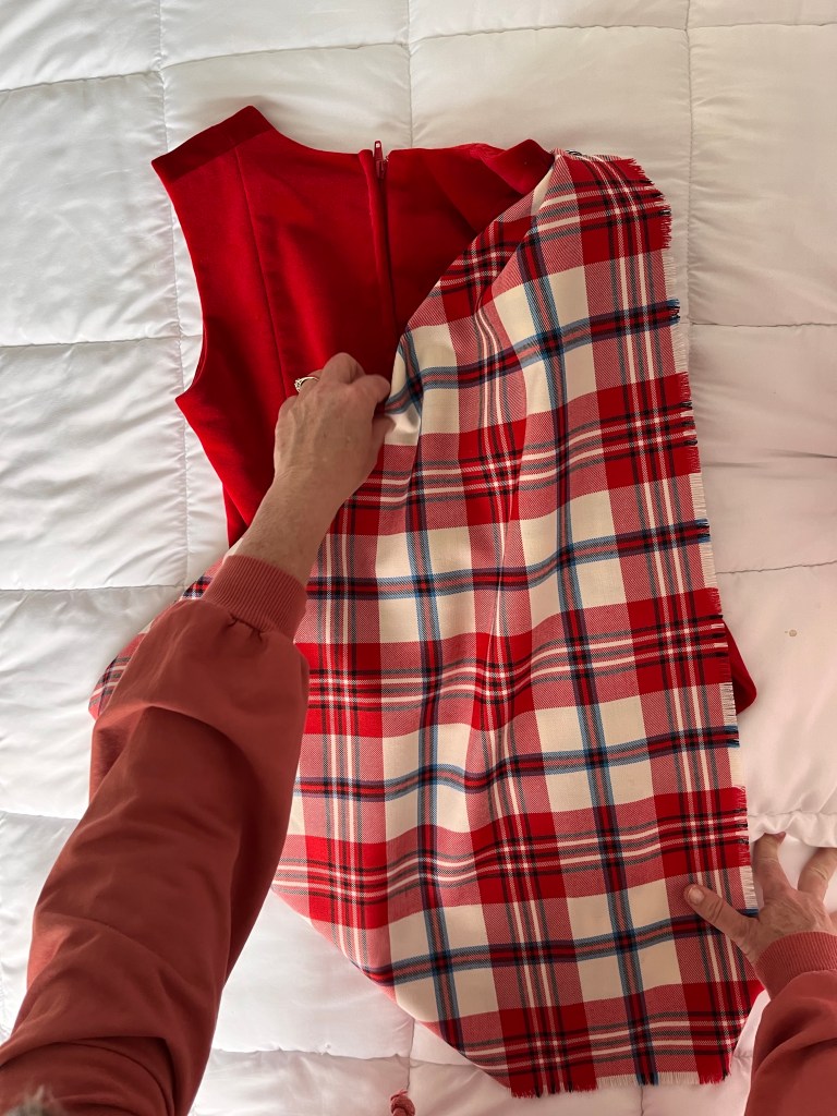 A red plaid and velvet outfit