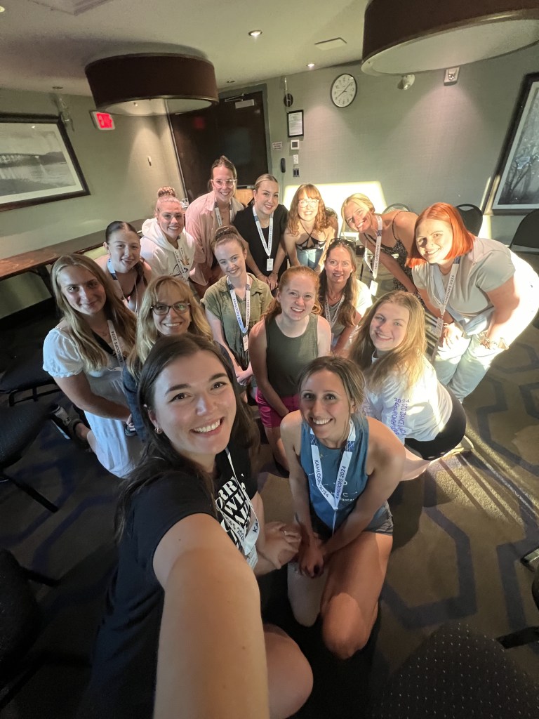 A selfie of a group of smiling women